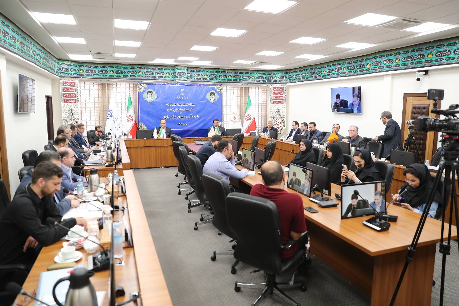 توسعه خدمات الکترونیک، محور تفاهم میان بانک ملی ایران و سازمان ثبت احوال کشور